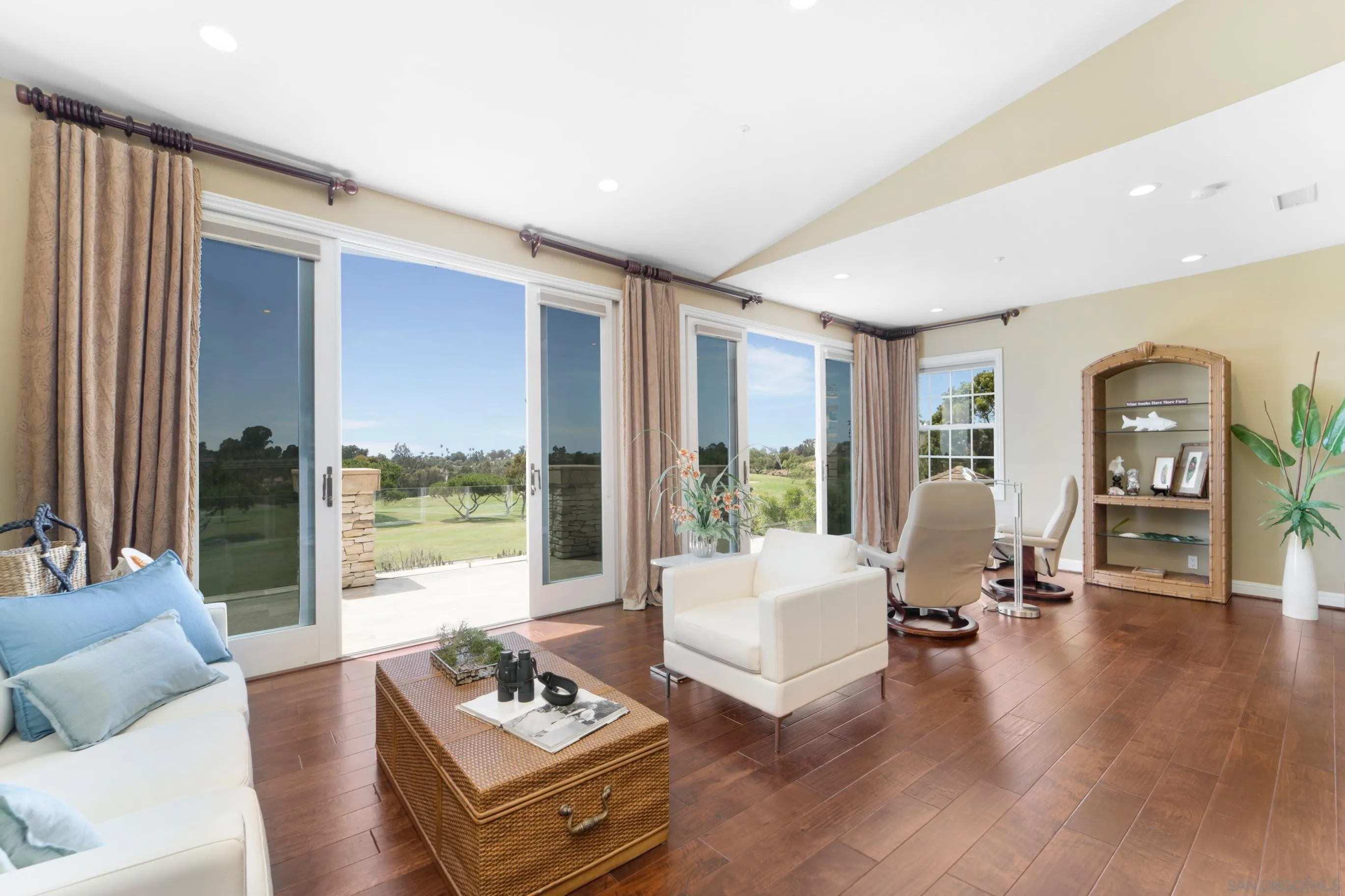 698 Cypress Hills Drive Encinitas, CA 92024 - Photo 23 of 67 a living room with furniture and a large window