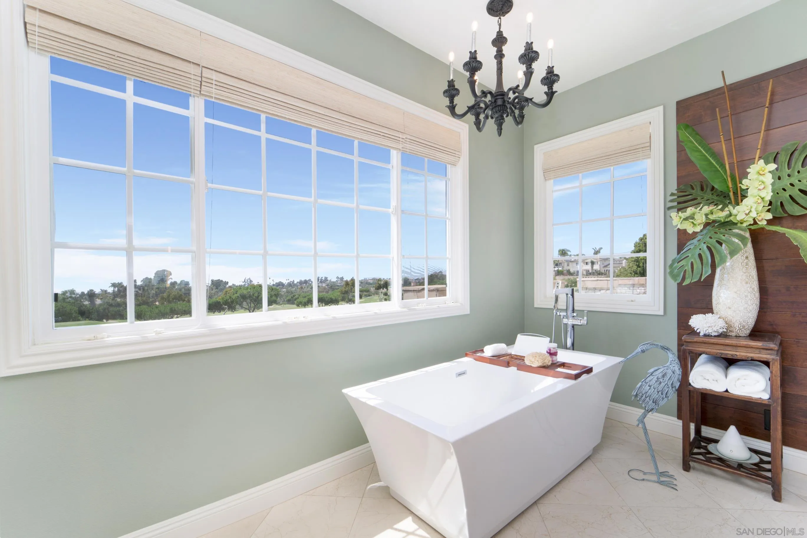 698 Cypress Hills Drive Encinitas, CA 92024 - Photo 32 of 67 a very nice looking dining room with a large window table and chairs