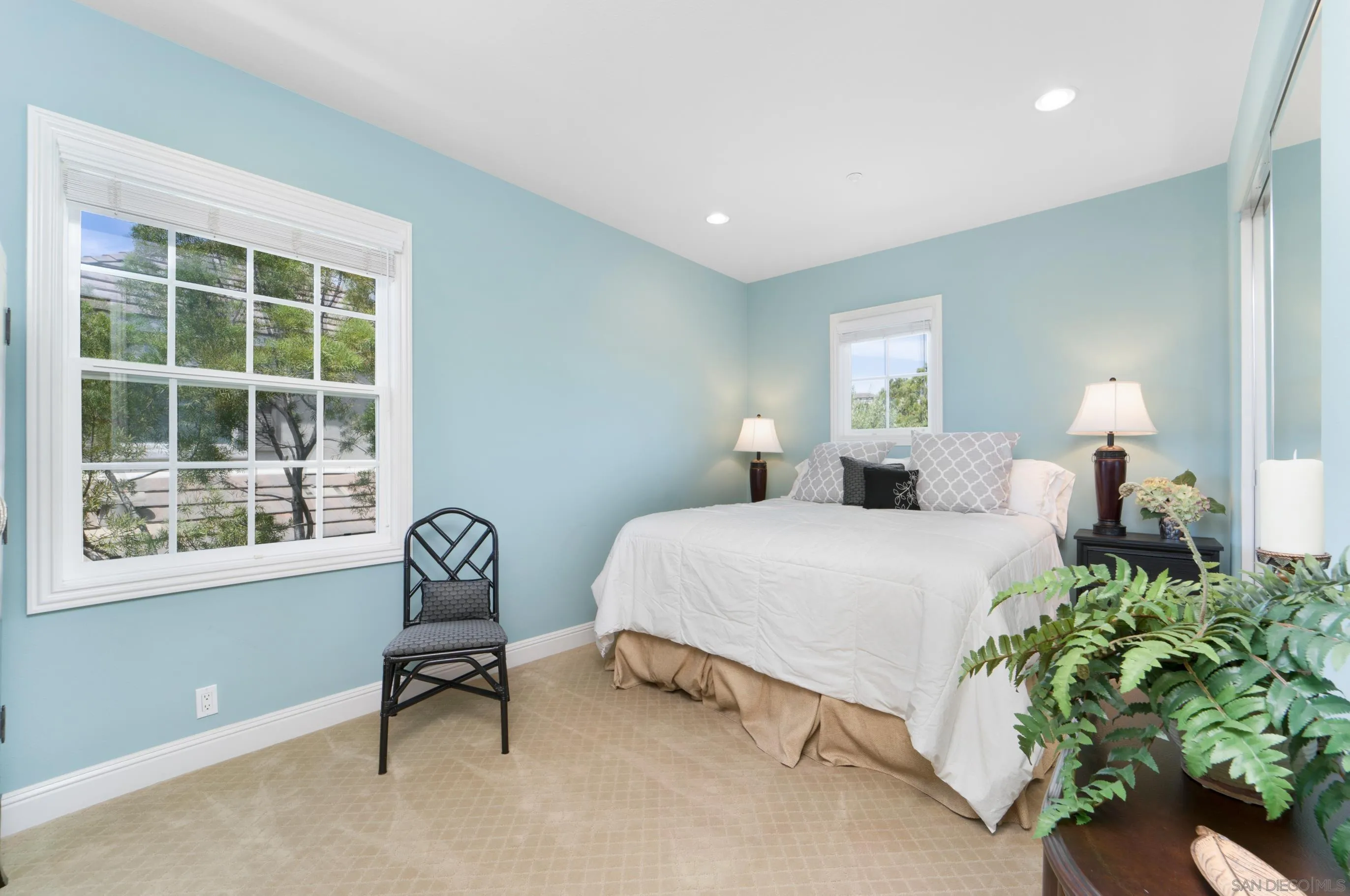 698 Cypress Hills Drive Encinitas, CA 92024 - Photo 37 of 67 a bedroom with bed and a window