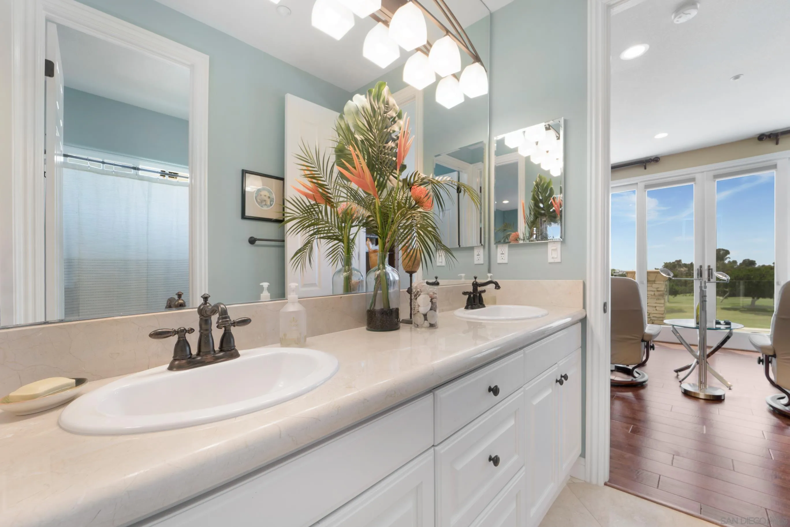 698 Cypress Hills Drive Encinitas, CA 92024 - Photo 38 of 67 a bathroom with a double vanity sink mirror and vanity