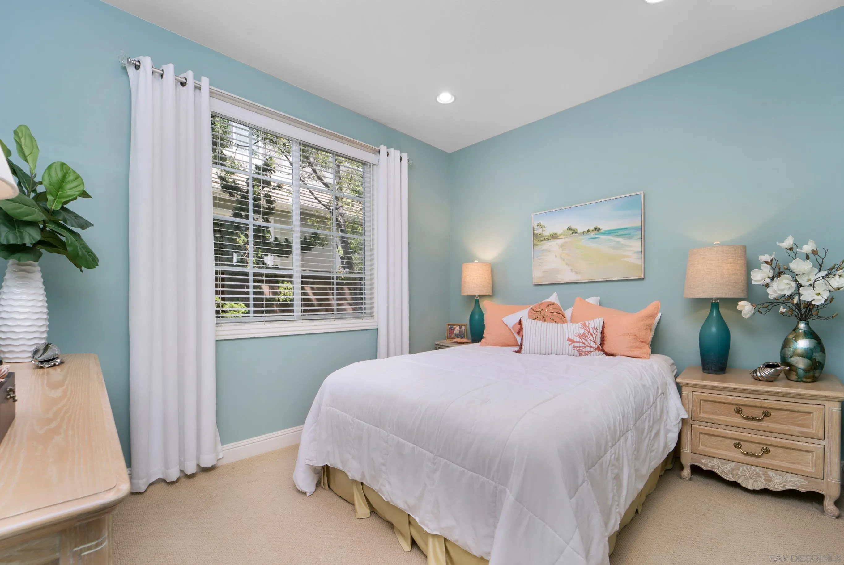 698 Cypress Hills Drive Encinitas, CA 92024 - Photo 40 of 67 a bedroom with a bed potted plant and a window
