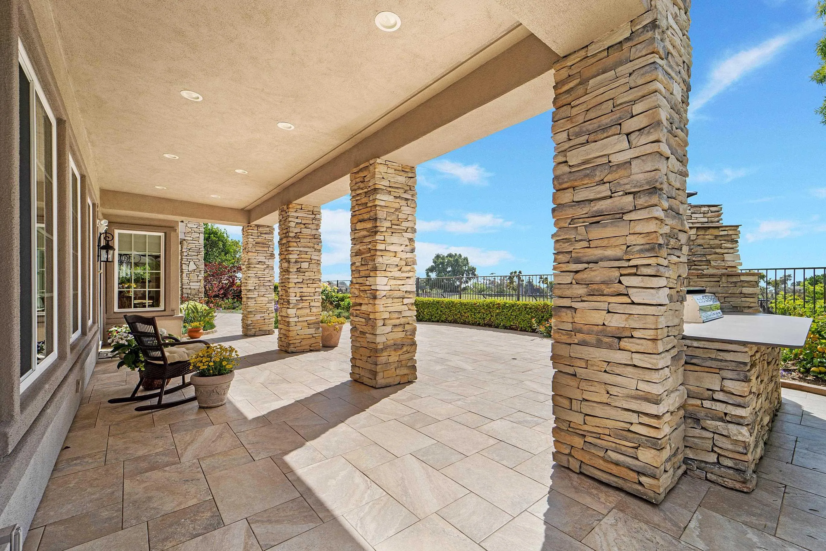 698 Cypress Hills Drive Encinitas, CA 92024 - Photo 47 of 67 a lobby with furniture and floor to ceiling window
