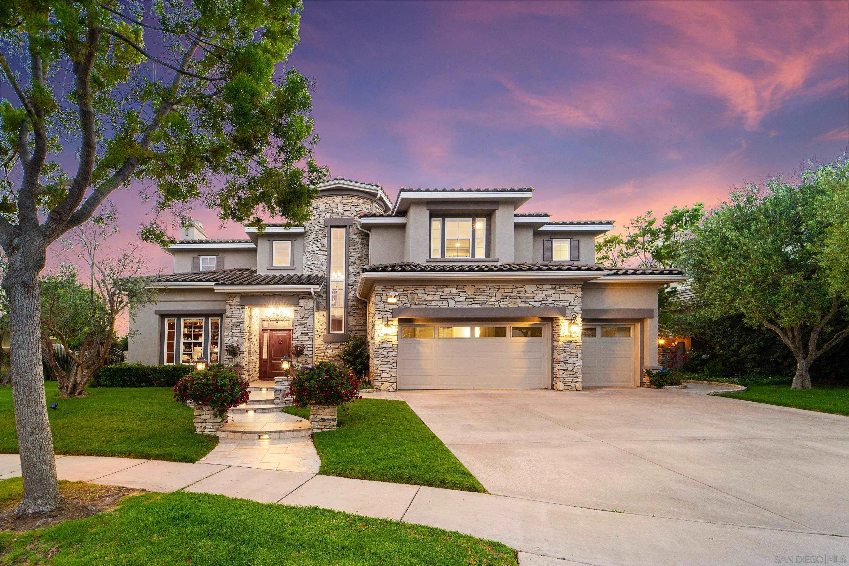 698 Cypress Hills Drive Encinitas, CA 92024 - Photo 55 of 67 a front view of a house with a yard and garage