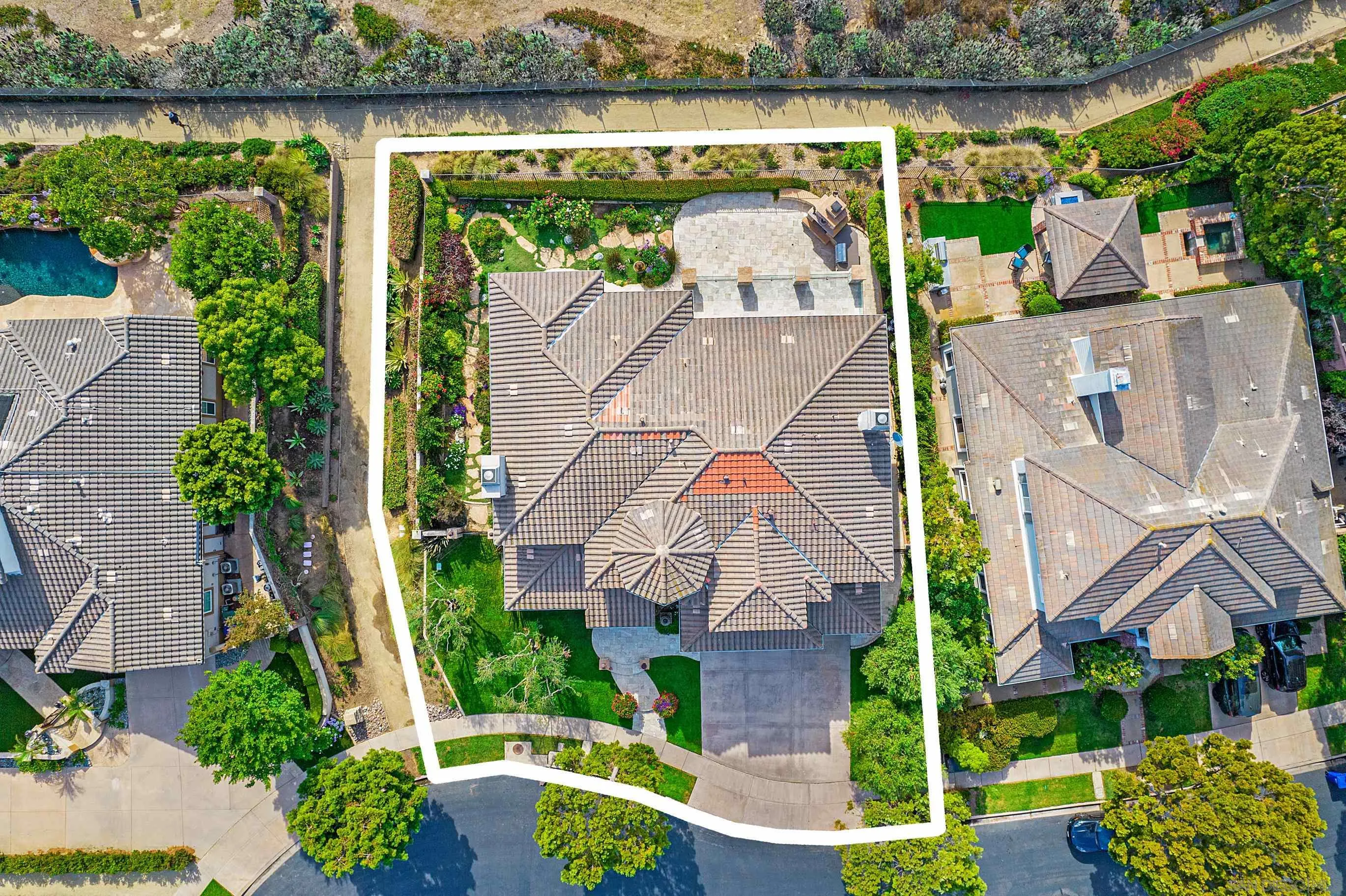 698 Cypress Hills Drive Encinitas, CA 92024 - Photo 66 of 67 an aerial view of a house with a garden and lake view