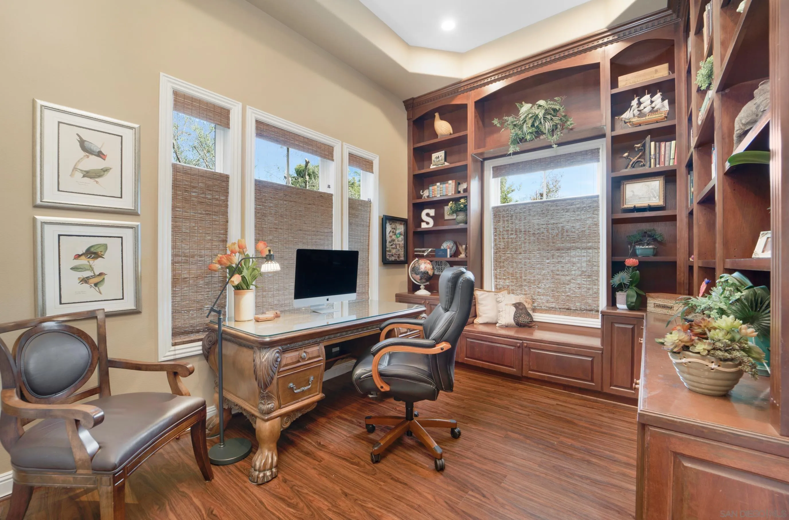 698 Cypress Hills Drive Encinitas, CA 92024 - Photo 9 of 67 a view of a workspace with furniture and a potted plant