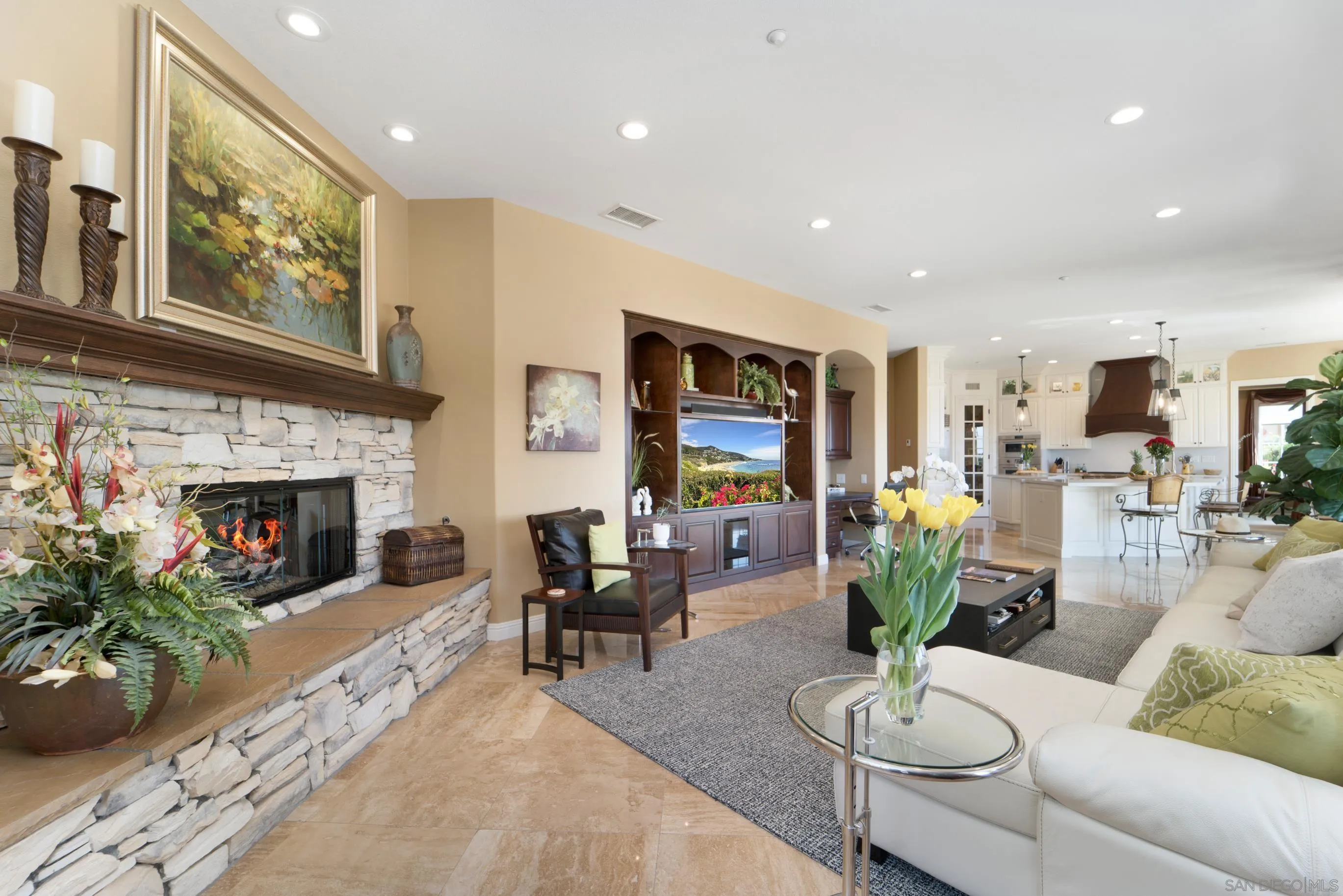 698 Cypress Hills Drive Encinitas, CA 92024 - Photo 10 of 67 a living room with furniture and a fireplace