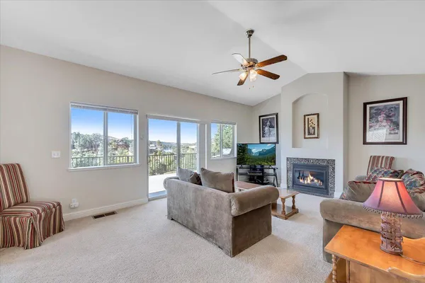 a living room with furniture and a window