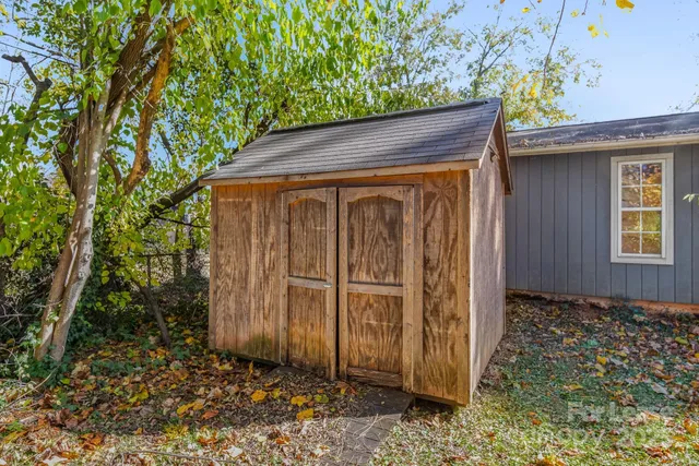 a wooden door in front of a house