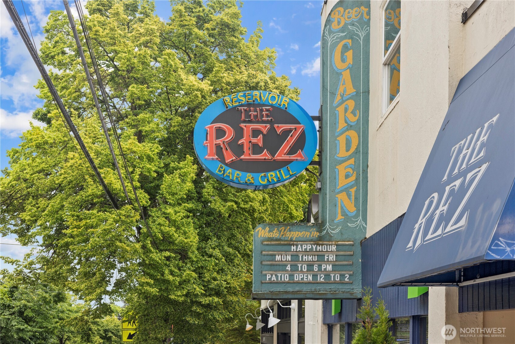 8521 Roosevelt Way Northeast Seattle, WA 98115 - Photo 16 of 18 a sign that is on a pole