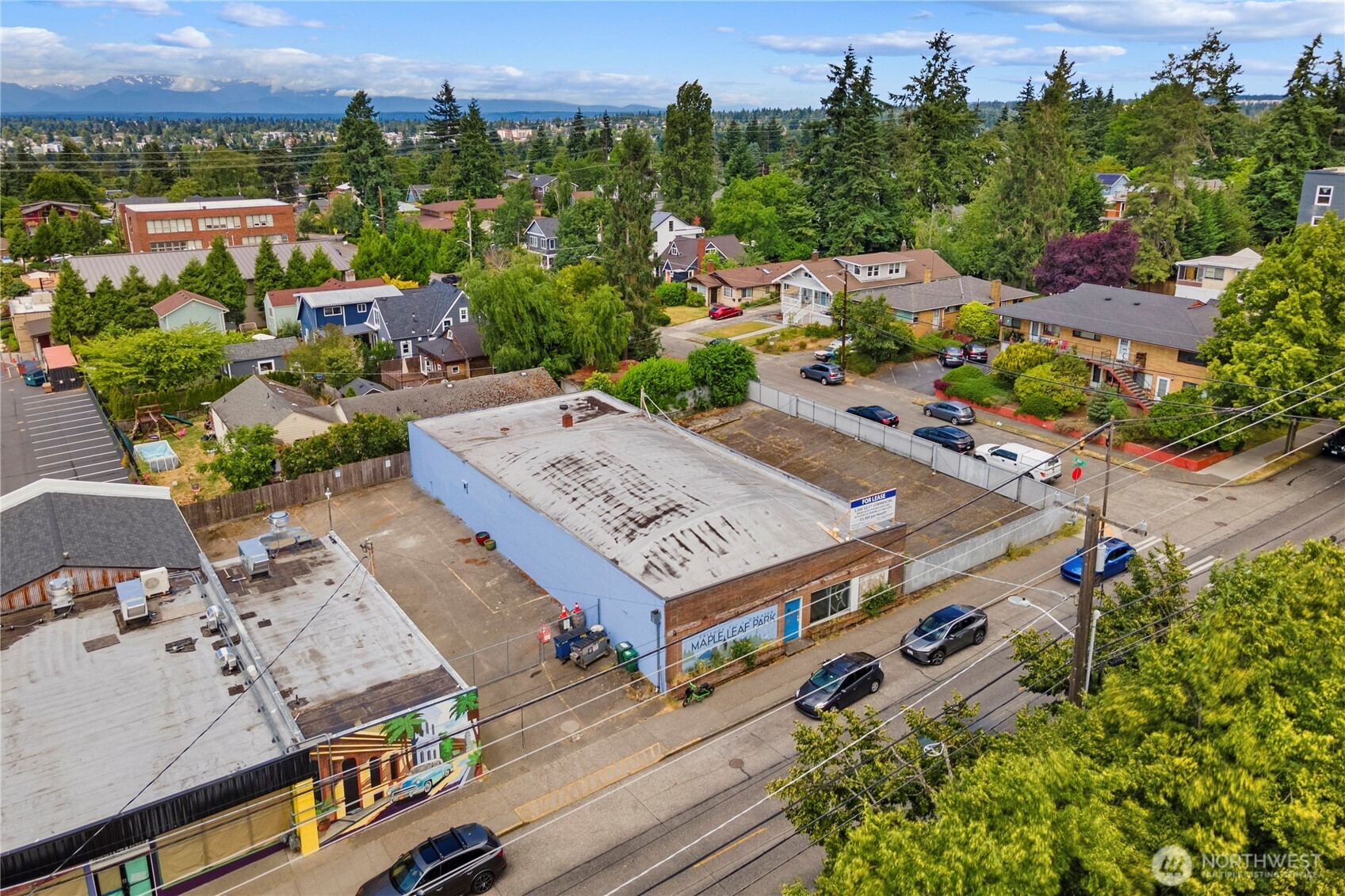 8521 Roosevelt Way Northeast Seattle, WA 98115 - Photo 2 of 18 an aerial view of a house with a garden