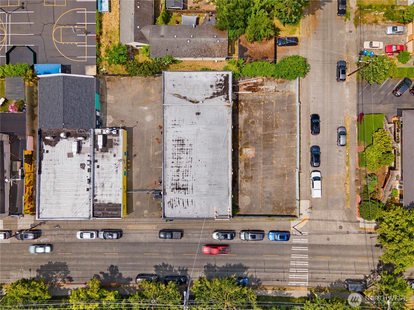 8521 Roosevelt Way Northeast Seattle, WA 98115 - Photo 4 of 18 aerial view of a brick building with plants