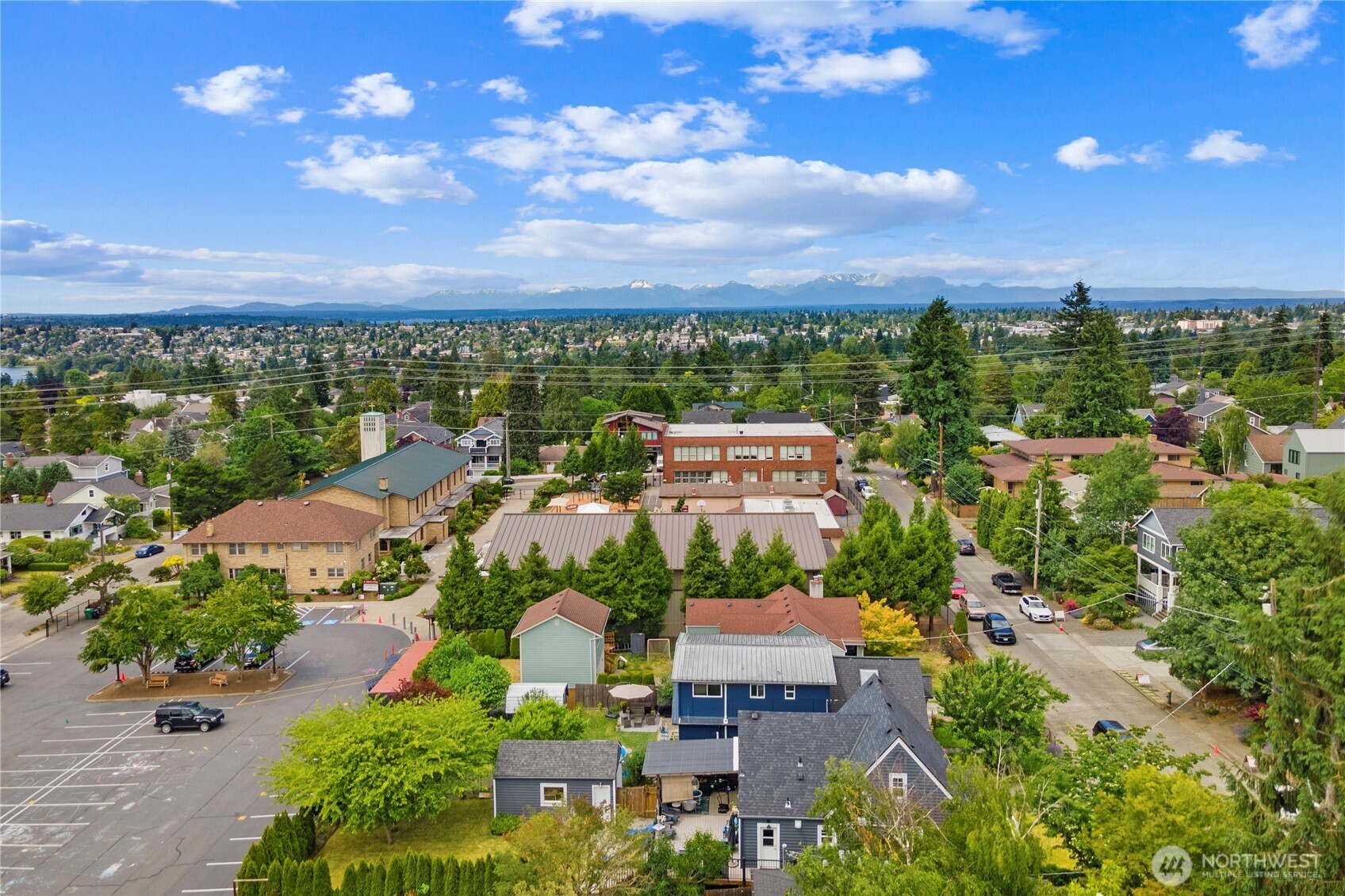 8521 Roosevelt Way Northeast Seattle, WA 98115 - Photo 9 of 18 an aerial view of residential houses with outdoor space and street view