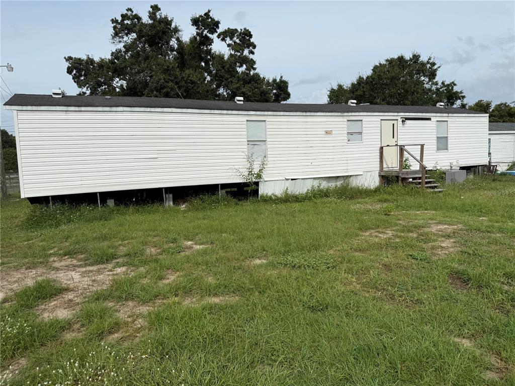 340 South Hankin Road Bartow, FL 33830 - Photo 13 of 16 a view of a backyard