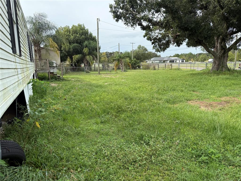 340 South Hankin Road Bartow, FL 33830 - Photo 16 of 16 a view of a garden with trees