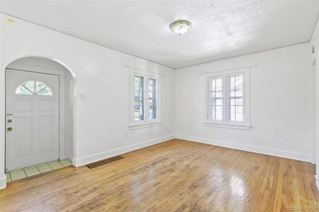 an empty room with windows