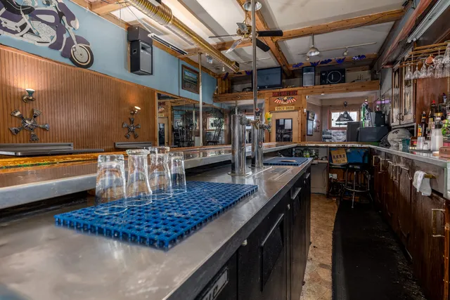 a view of a building with sitting area