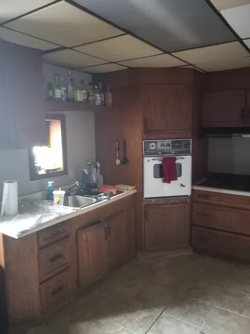 a bedroom with bed and a fireplace