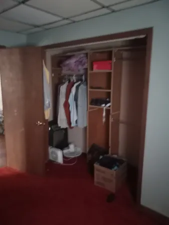 a room with furniture and wooden floor