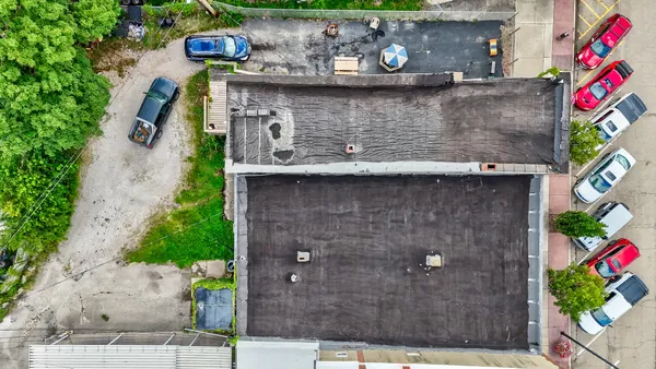 a front view of a house with an outdoor space