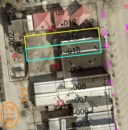 a utility room with lots of different colored cloths