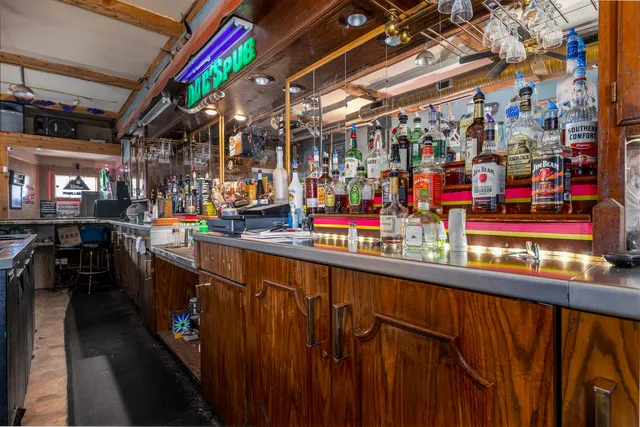 a view of swimming pool with outdoor seating