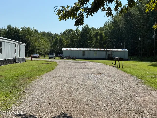a view of a bench in a park