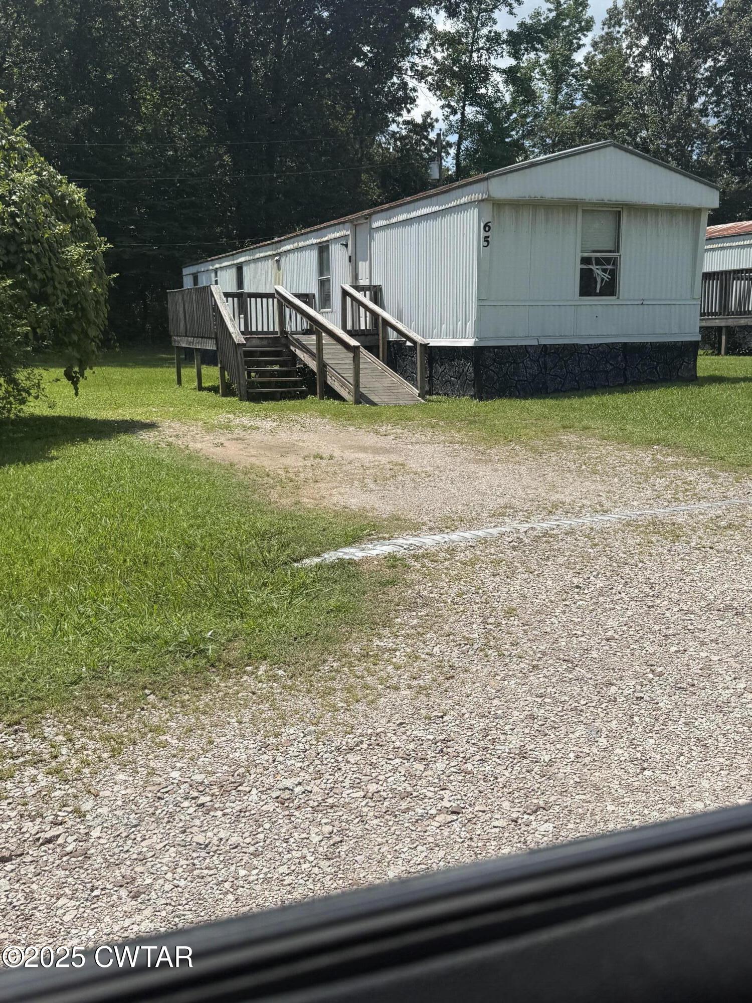 0 Skylar Way Middleton, TN 38052 - Photo 6 of 11 a view of a backyard with plants and a patio