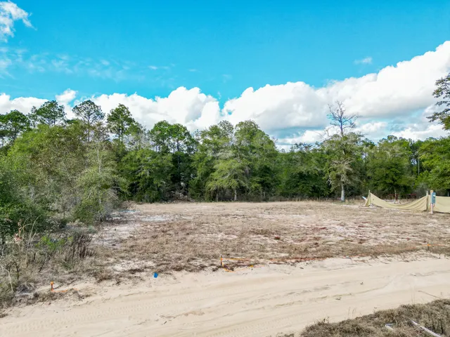 a view of a road with a yard