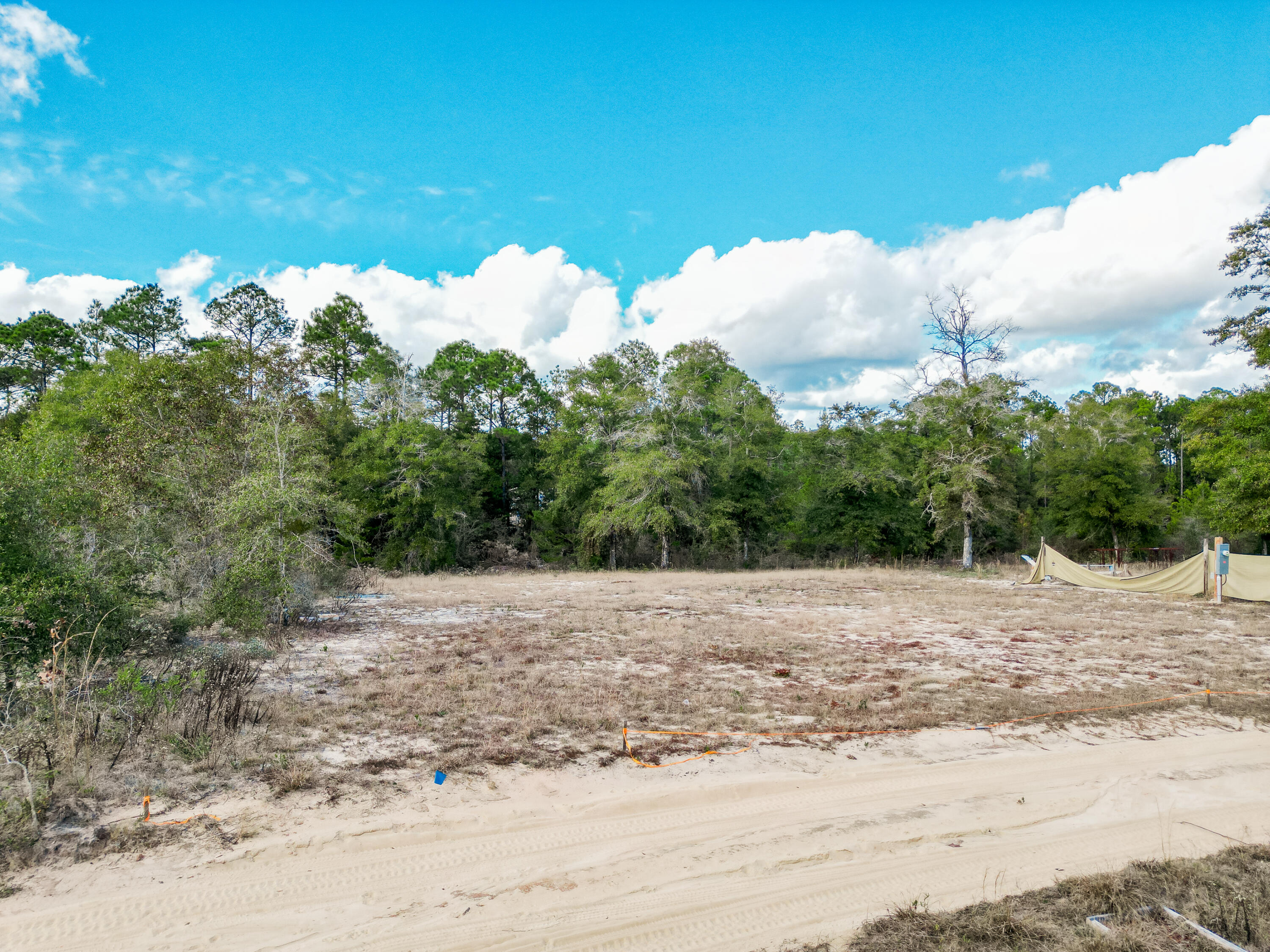 4712 Canary Way Crestview, FL 32539 - Photo 17 of 17 a view of a road with a yard