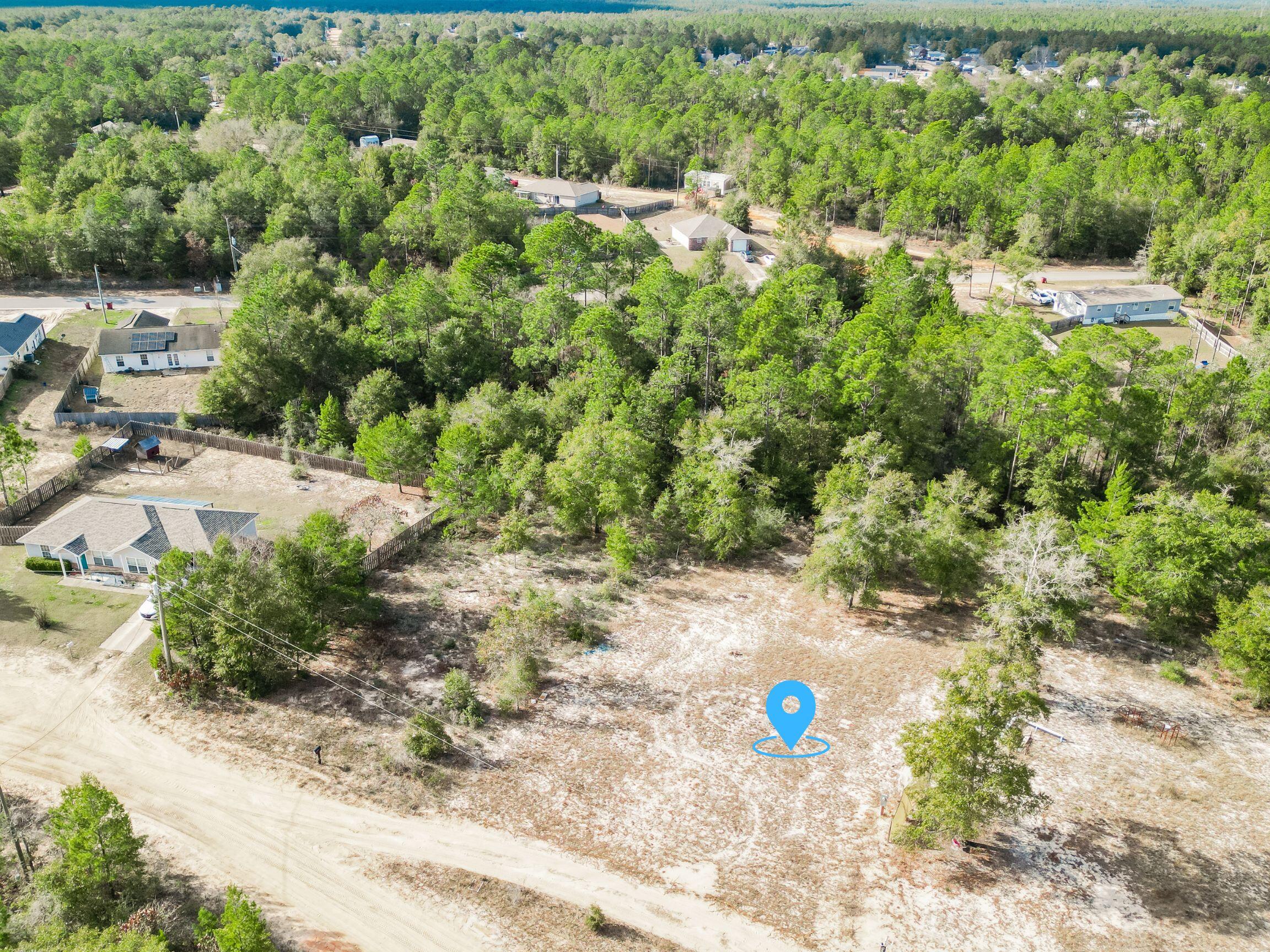 4712 Canary Way Crestview, FL 32539 - Photo 3 of 17 a view of outdoor space with a street