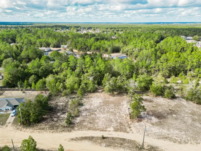 a view of a yard with an outdoor space