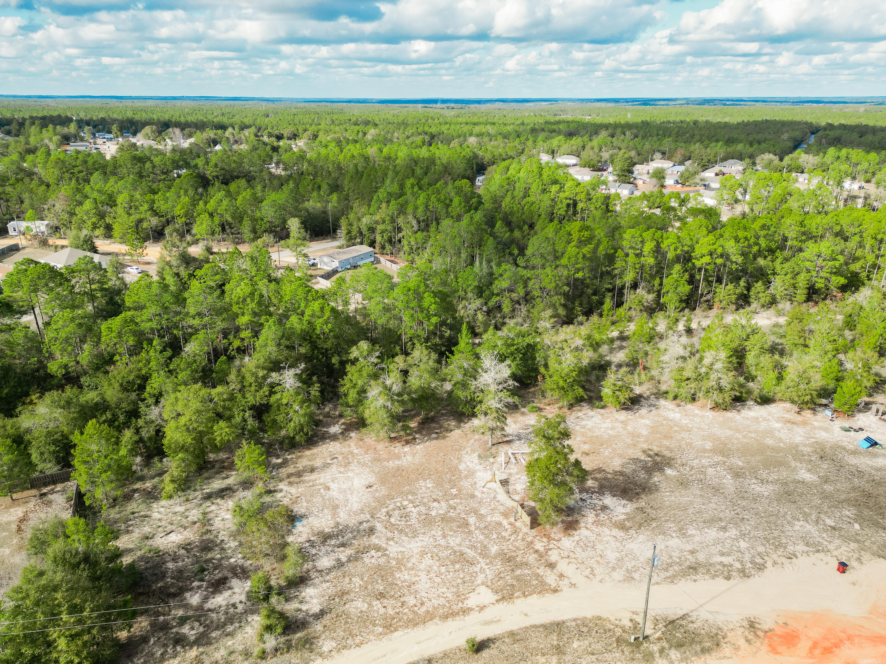 4712 Canary Way Crestview, FL 32539 - Photo 8 of 17 a view of a yard with an outdoor space