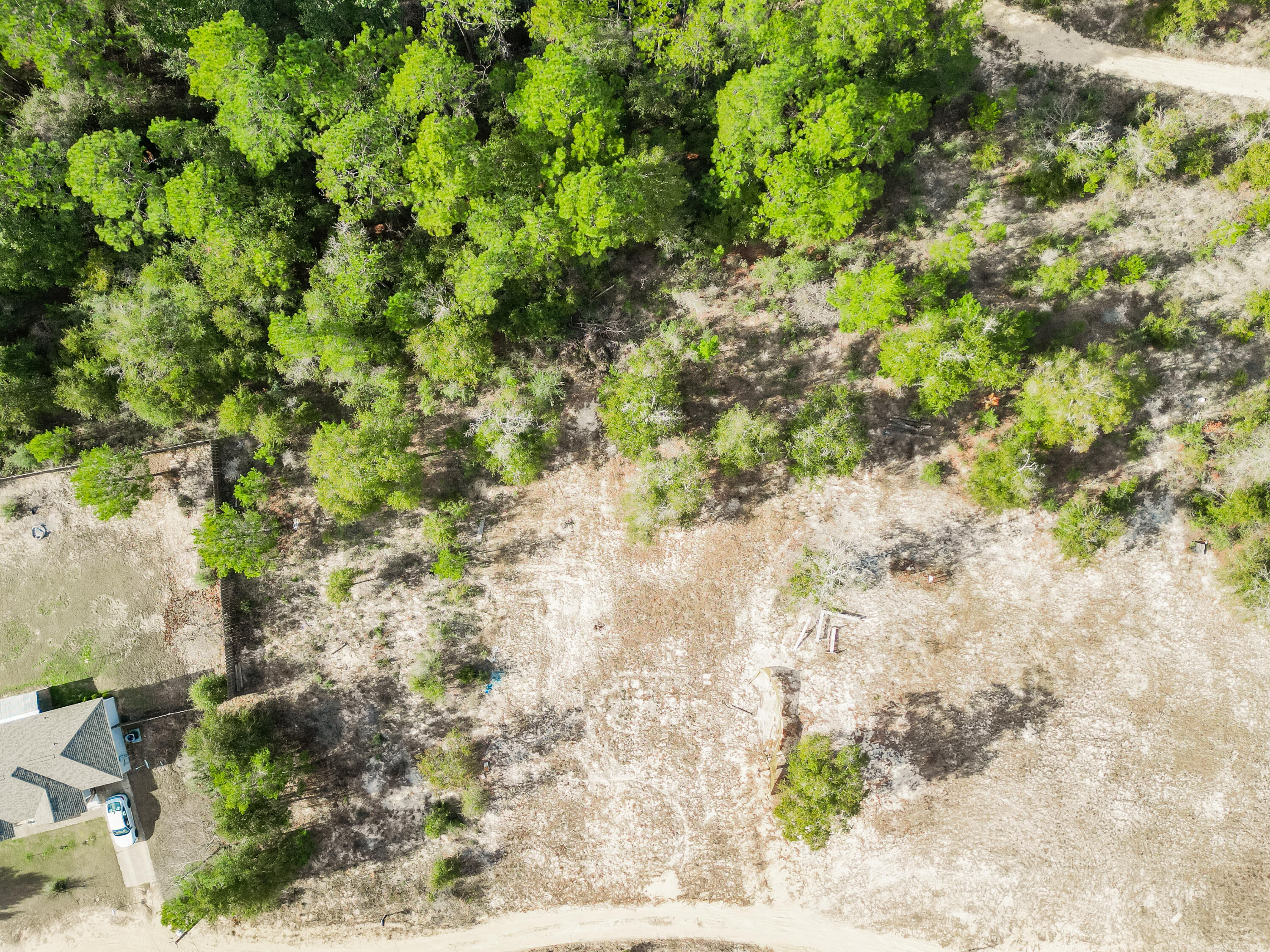 4712 Canary Way Crestview, FL 32539 - Photo 10 of 17 a backyard of a house with a yard