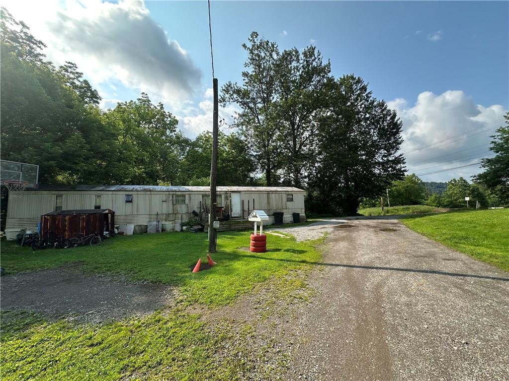 20e Engle Road Industry, PA 15052 - Photo 2 of 5 a view of yard with entertaining space and trees