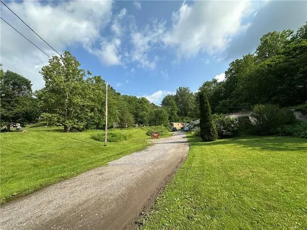 a view of a park and entertaining space