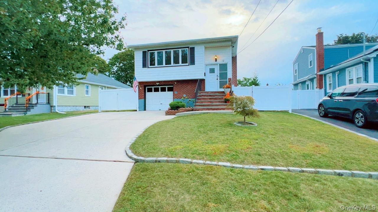 12 Terrace View Road Farmingdale, NY 11735 - Photo 1 of 21 a house view with a garden space