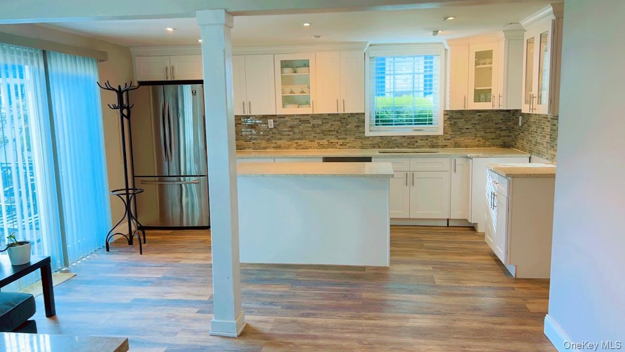 12 Terrace View Road Farmingdale, NY 11735 - Photo 13 of 21 a kitchen with stainless steel appliances granite countertop a refrigerator a sink and a stove