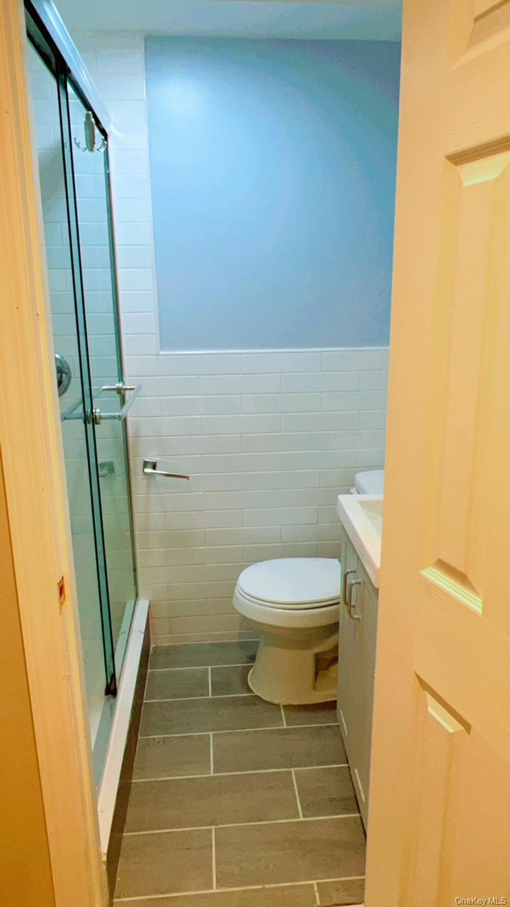 12 Terrace View Road Farmingdale, NY 11735 - Photo 17 of 21 a bathroom with a toilet and a shower