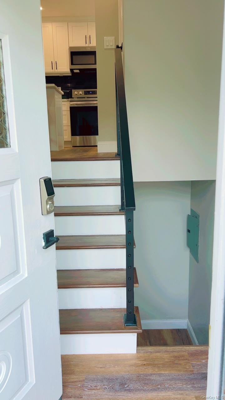 12 Terrace View Road Farmingdale, NY 11735 - Photo 2 of 21 a view of entryway and hall with wooden floor