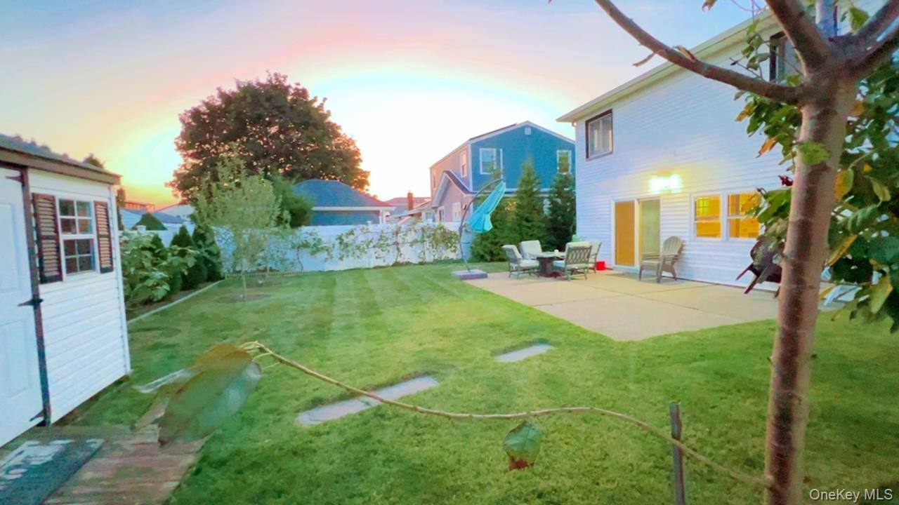 12 Terrace View Road Farmingdale, NY 11735 - Photo 21 of 21 a view of a house with big yard and a large tree