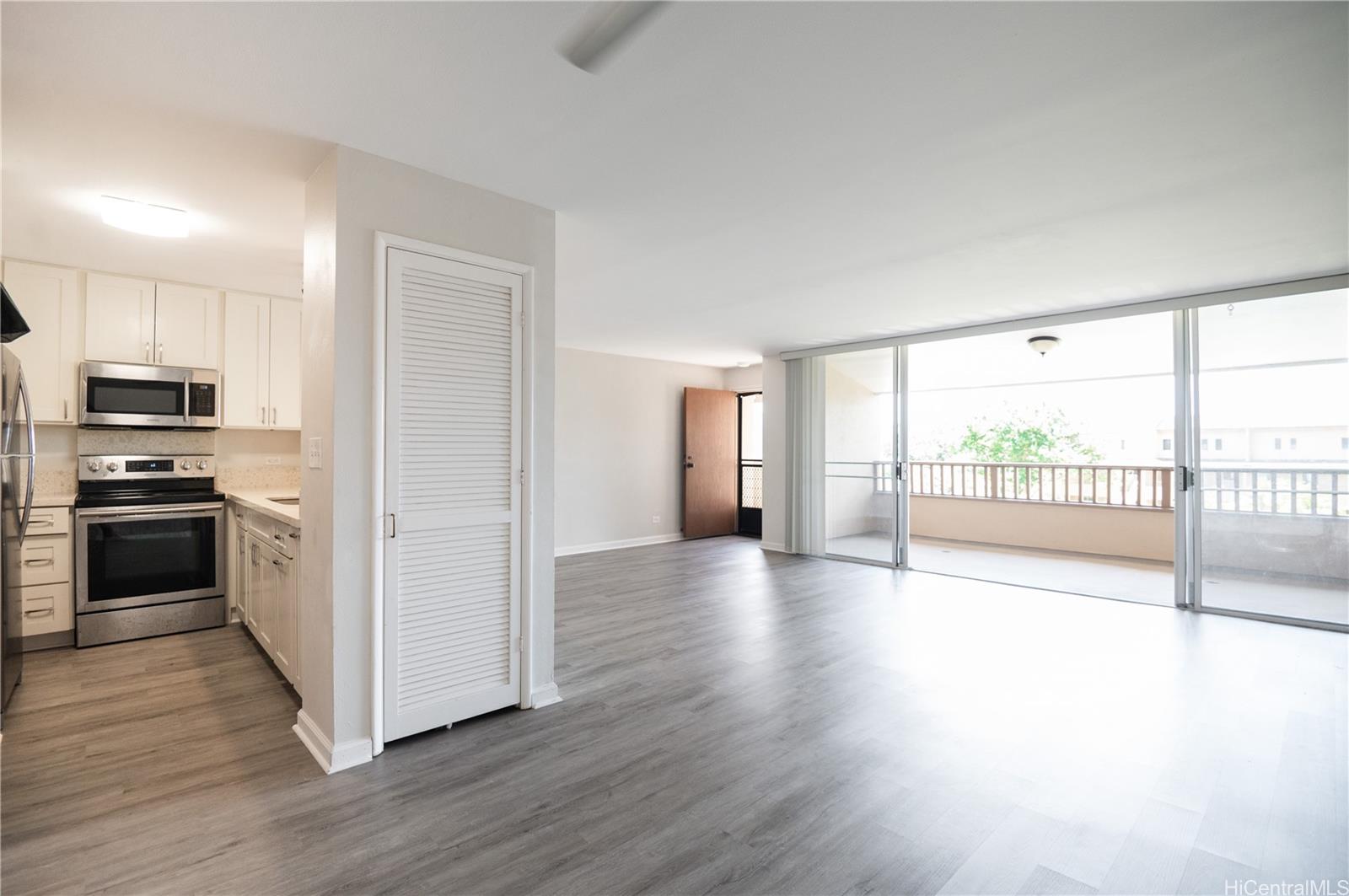 46-159 Meheanu Loop, Unit 3222 Kaneohe, HI 96744 - Photo 1 of 1 a view of a kitchen with a sink and a stove top oven