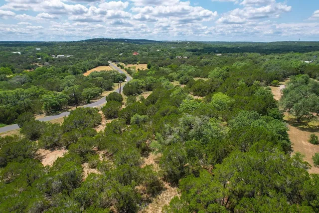 a view of a field with an outdoor space