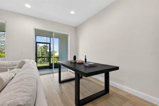 a living room with furniture and a window