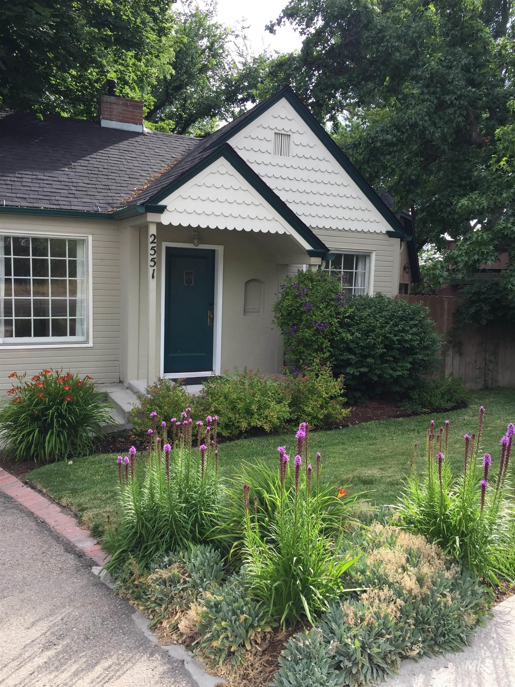 2551 West Hill Road Boise, ID 83702 - Photo 3 of 24 Bungalow featuring a front yard and a chimney