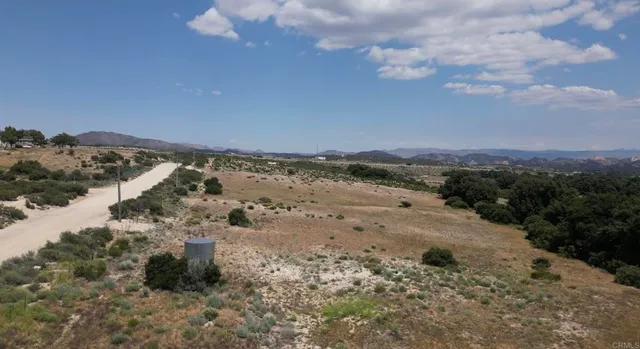 a view of beach and mountain