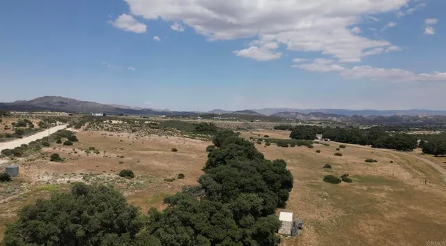 a view of ocean and mountain