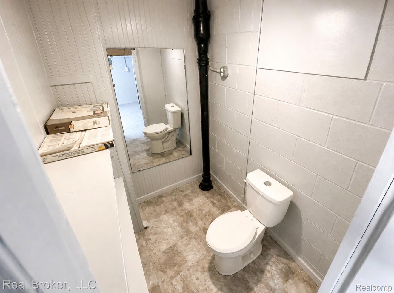603 Vernier Road Grosse Pointe, MI 48236 - Photo 22 of 33 Bathroom featuring toilet and vanity