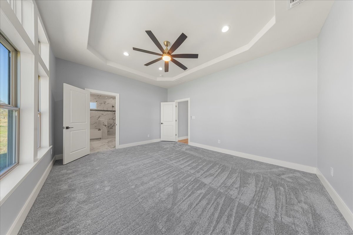 217 Gato Road Cedar Creek, TX 78612 - Photo 23 of 40 an empty room with closet and windows