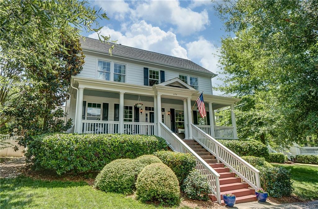 694 Revival Row Fort Mill, SC 29708 - Photo 2 of 46 a front view of a house with a yard