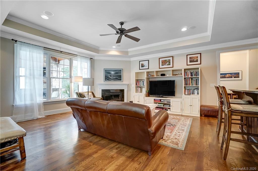 694 Revival Row Fort Mill, SC 29708 - Photo 17 of 46 a living room with furniture flat screen tv and a fireplace